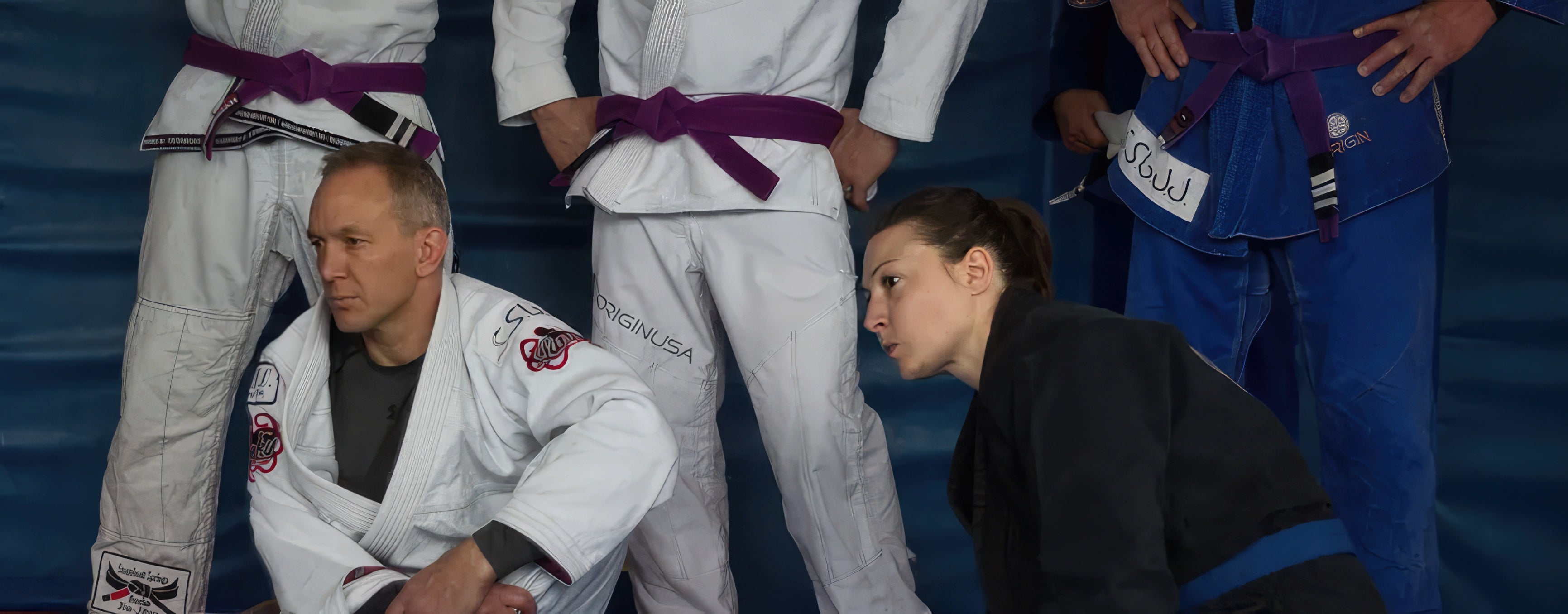 Group of Brazilian Jiu-Jitsu students lined up during a training session
